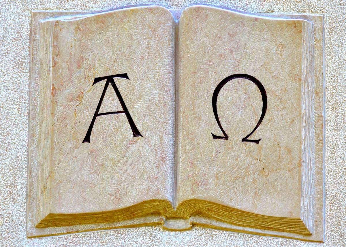 alpha omega alpha omega symbols in a book
